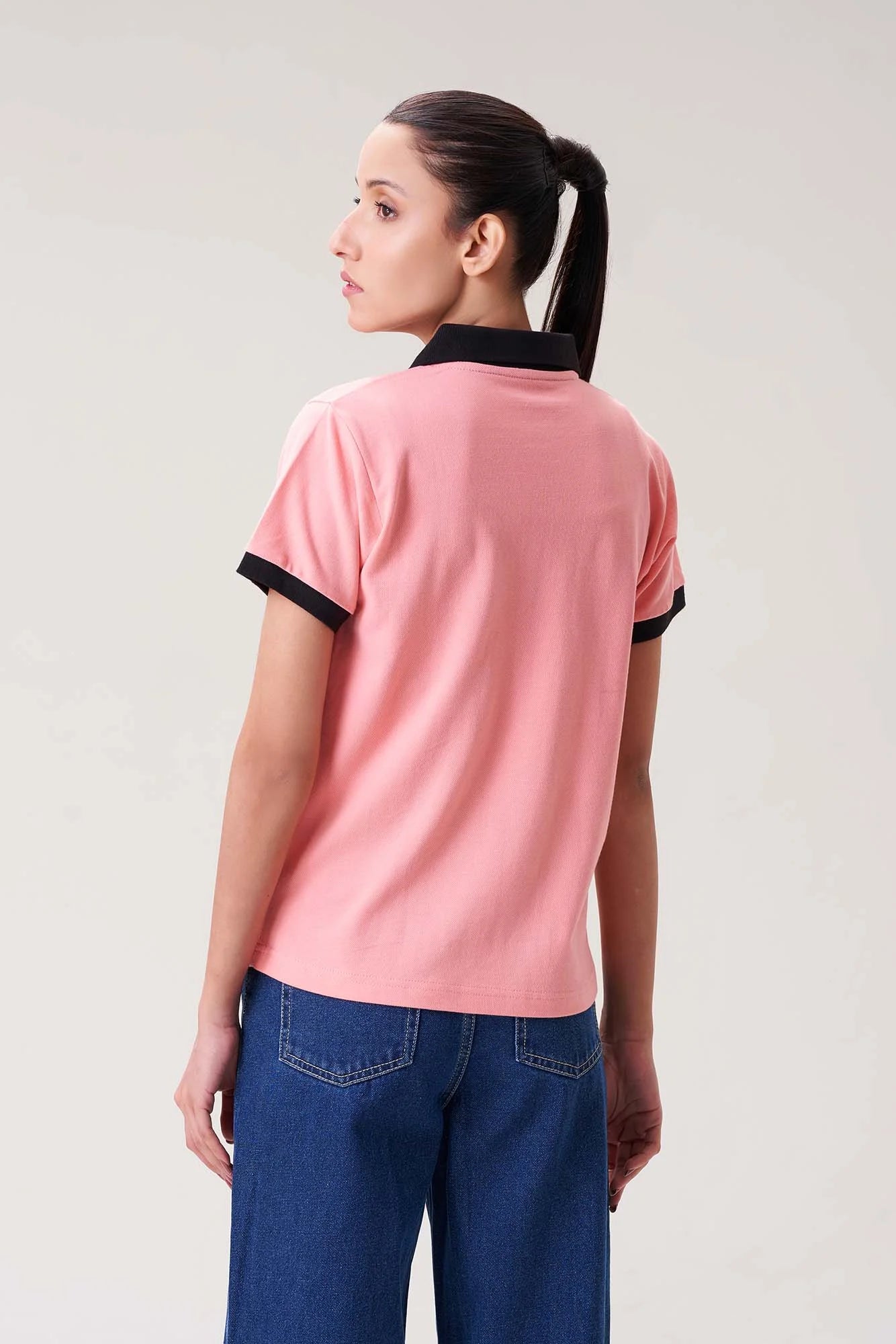 Soft Pink Polo Shirt with Black Collar for Women