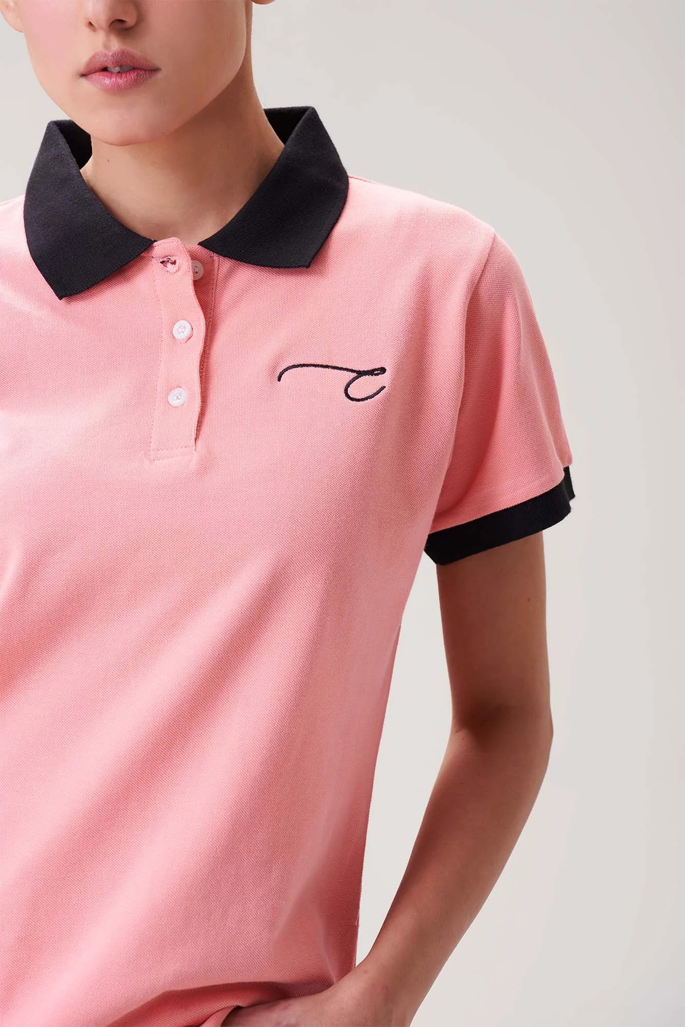 Soft Pink Polo Shirt with Black Collar for Women