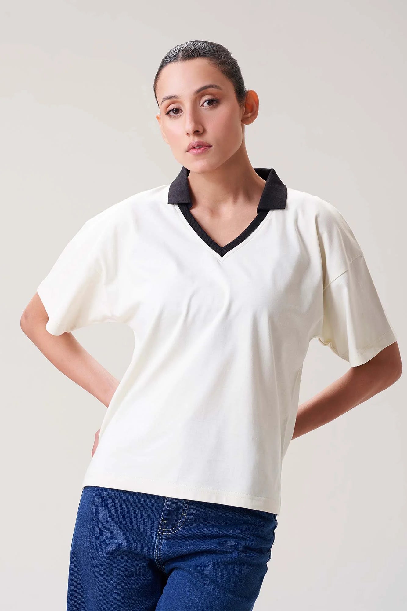 Elegant White Polo Shirt with Black Collar for Women