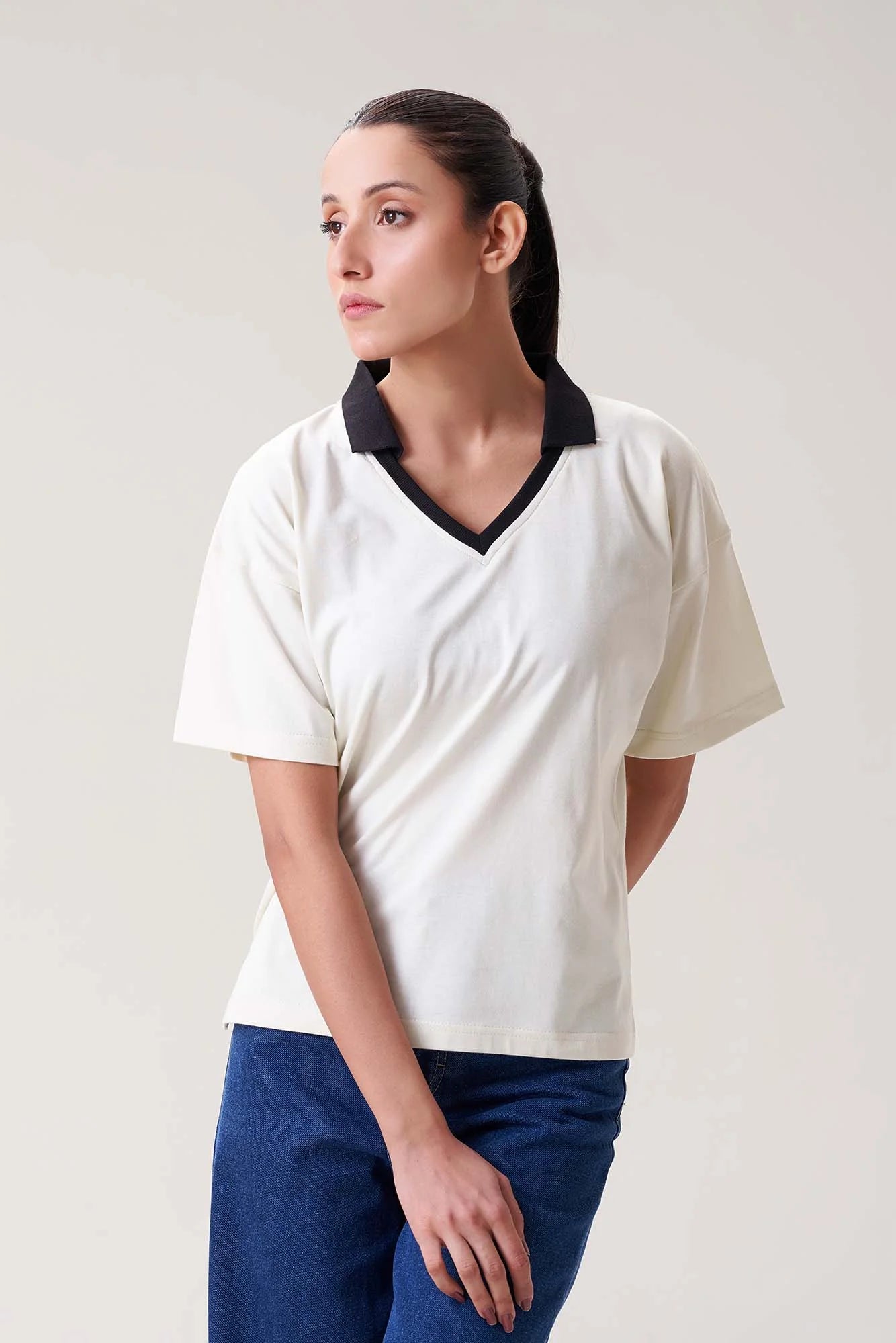 Elegant White Polo Shirt with Black Collar for Women