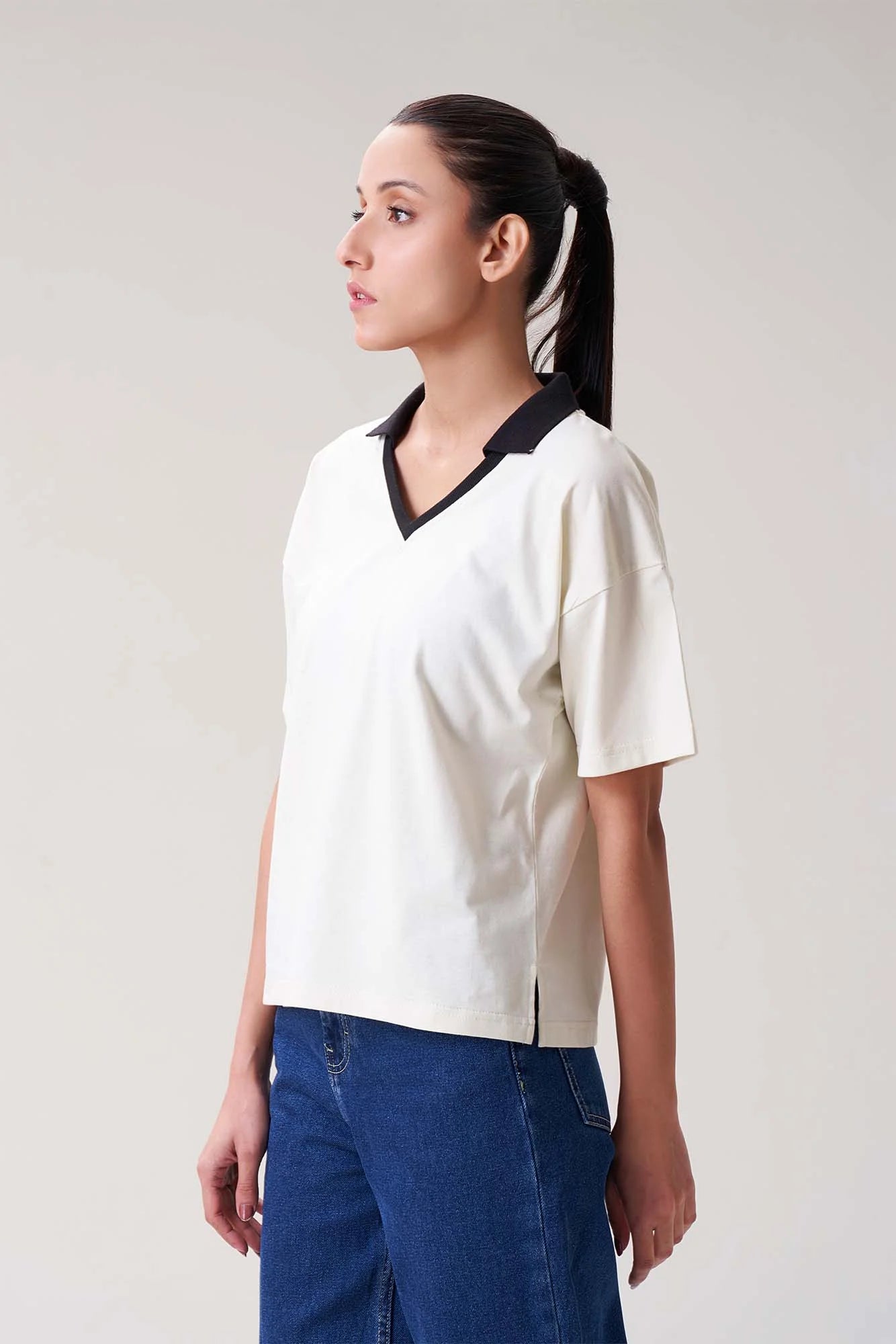 Elegant White Polo Shirt with Black Collar for Women