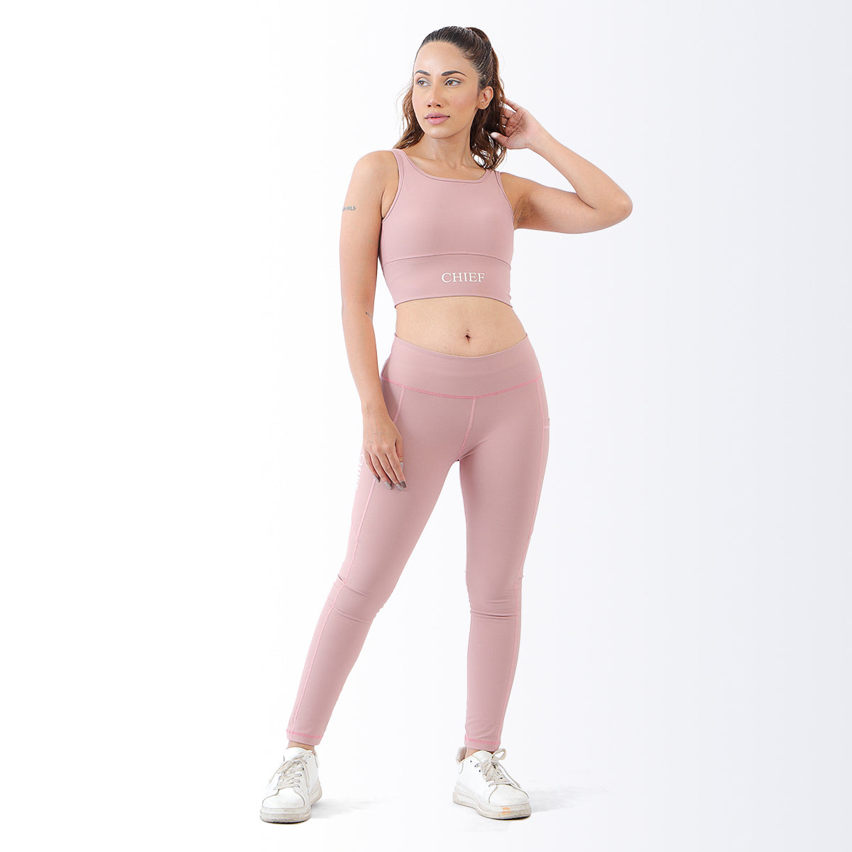 Pink sports shop bra and leggings